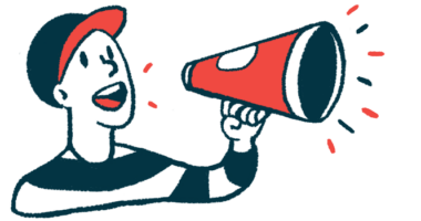 A person wearing a baseball cap speaks using a megaphone.